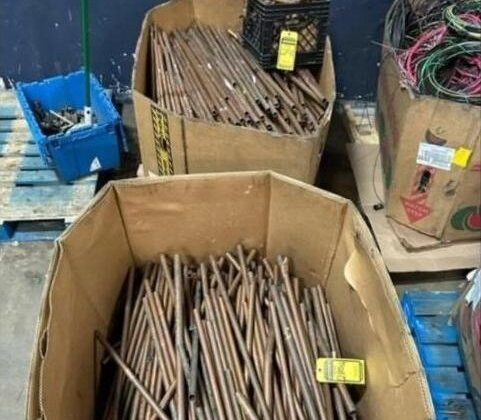 Boxes filled with straight copper tubing and pipe available as a material example