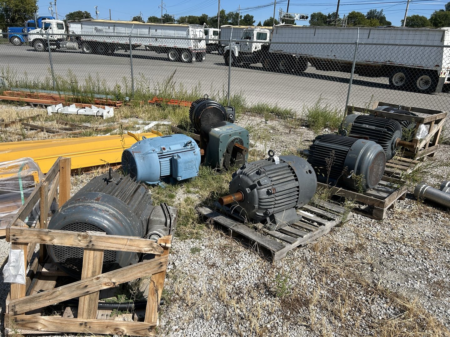 WEG industrial motors on pallets — plant surplus we purchased