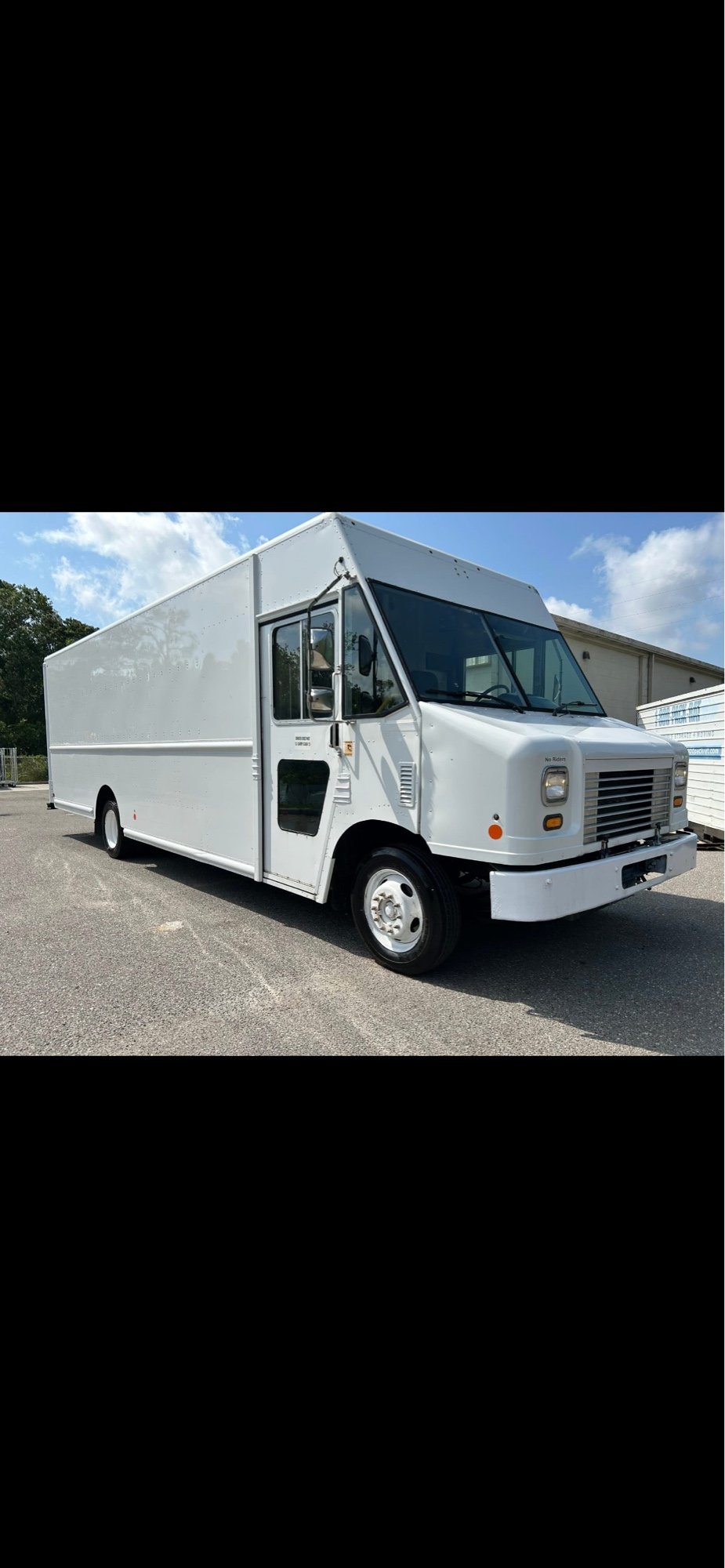Front view of a white Ford F59 step van we purchased