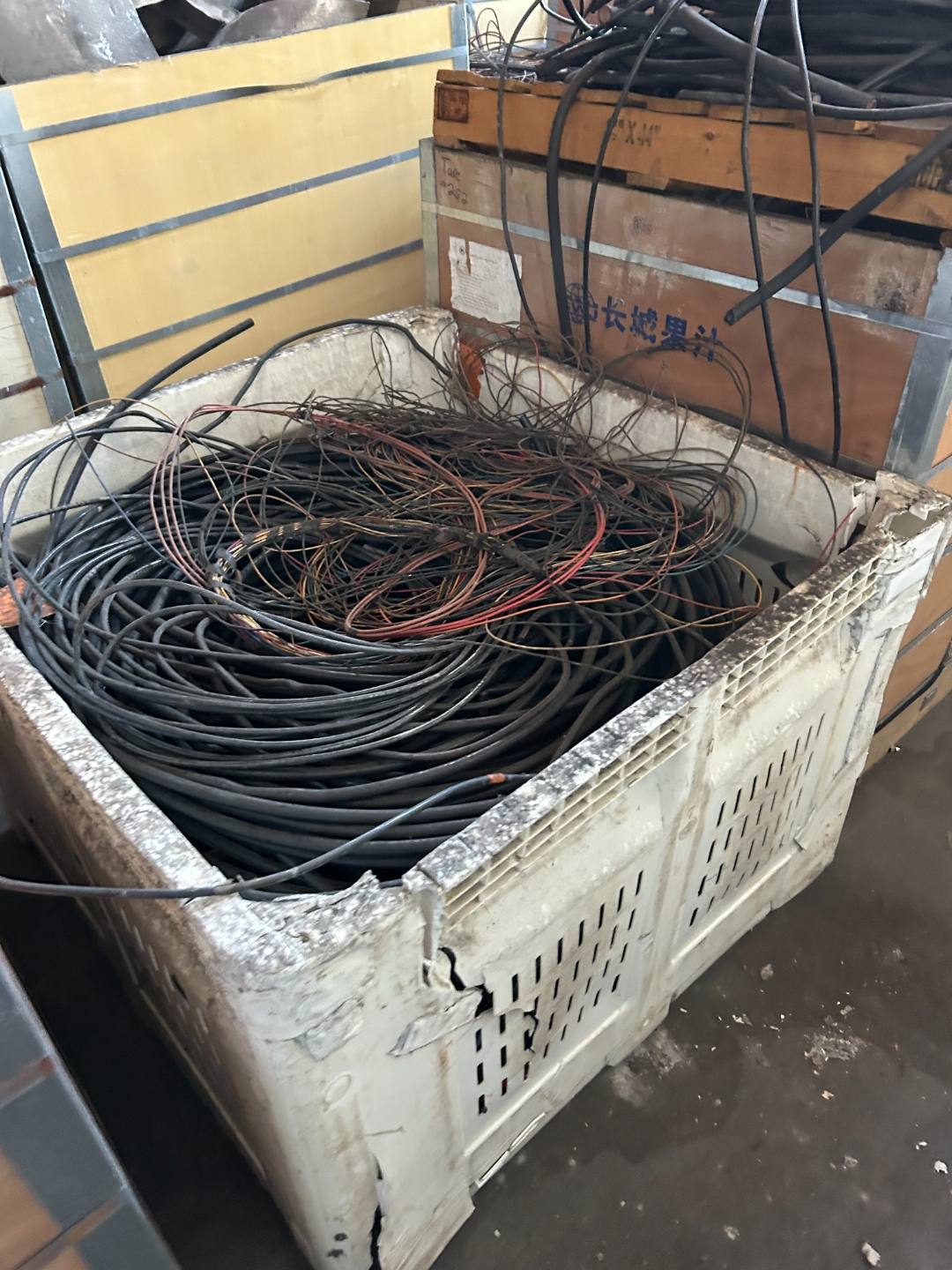 Crate of red and black insulated wire on a pallet