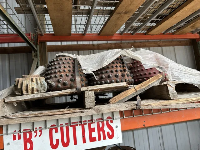 Stored rock-drilling cutters on a pallet