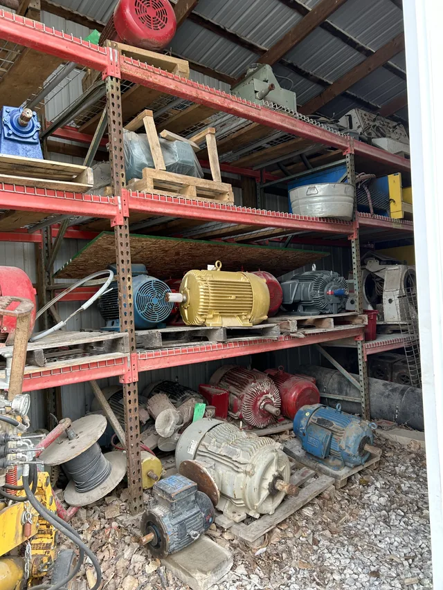 Additional view of assorted industrial motors on racks