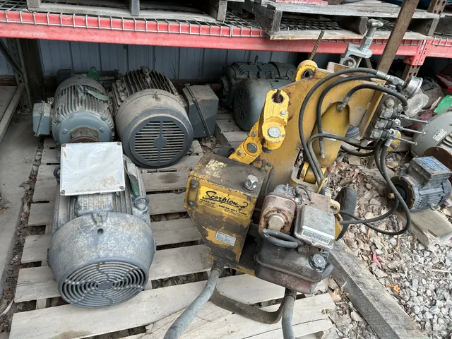 Electric motors and industrial equipment on a floor pallet