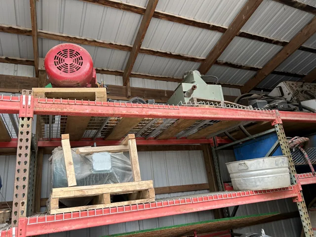 Large electric motor and industrial housings on shelving