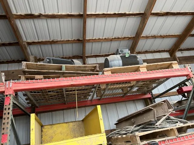 Large motor and surplus equipment on an upper shelf