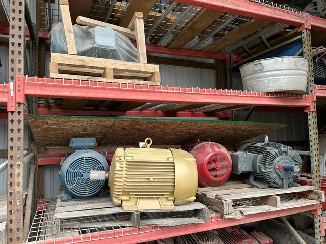 Yellow, blue and red industrial electric motors