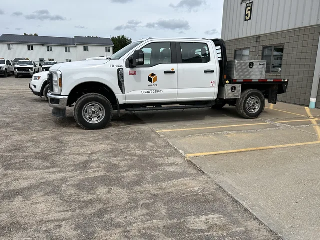 Ford crew-cab flatbed work truck