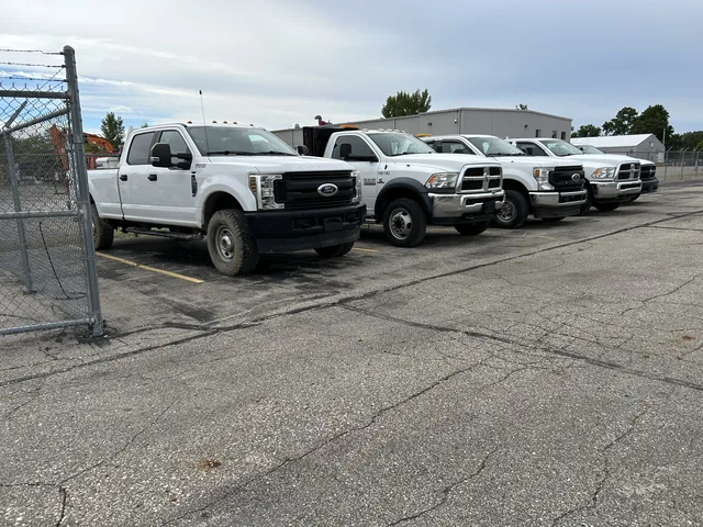 Lineup of work pickups and fleet vehicles